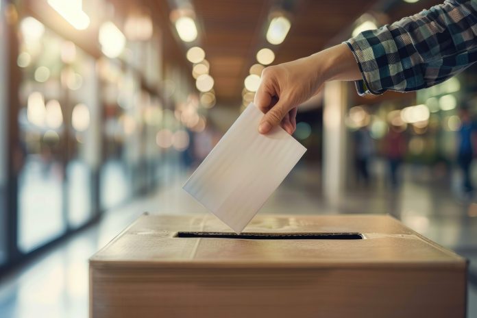 closeup-hand-putting-ballot-ballot-box-election-concept-ar-32-style-raw-stylize-250-job-id-bd6
